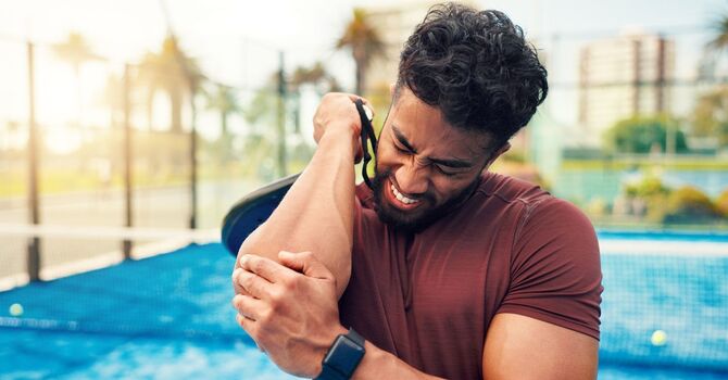 Why Tennis Elbow Keeps Coming Back—and How a Chiropractor Fixes the Root Cause